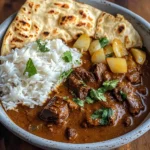 Beef Coconut Curry with Fragrant Rice and Warm Naan